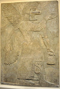 Wall relief depicting an eagle headed and winged man, Apkallu, from Nimrud